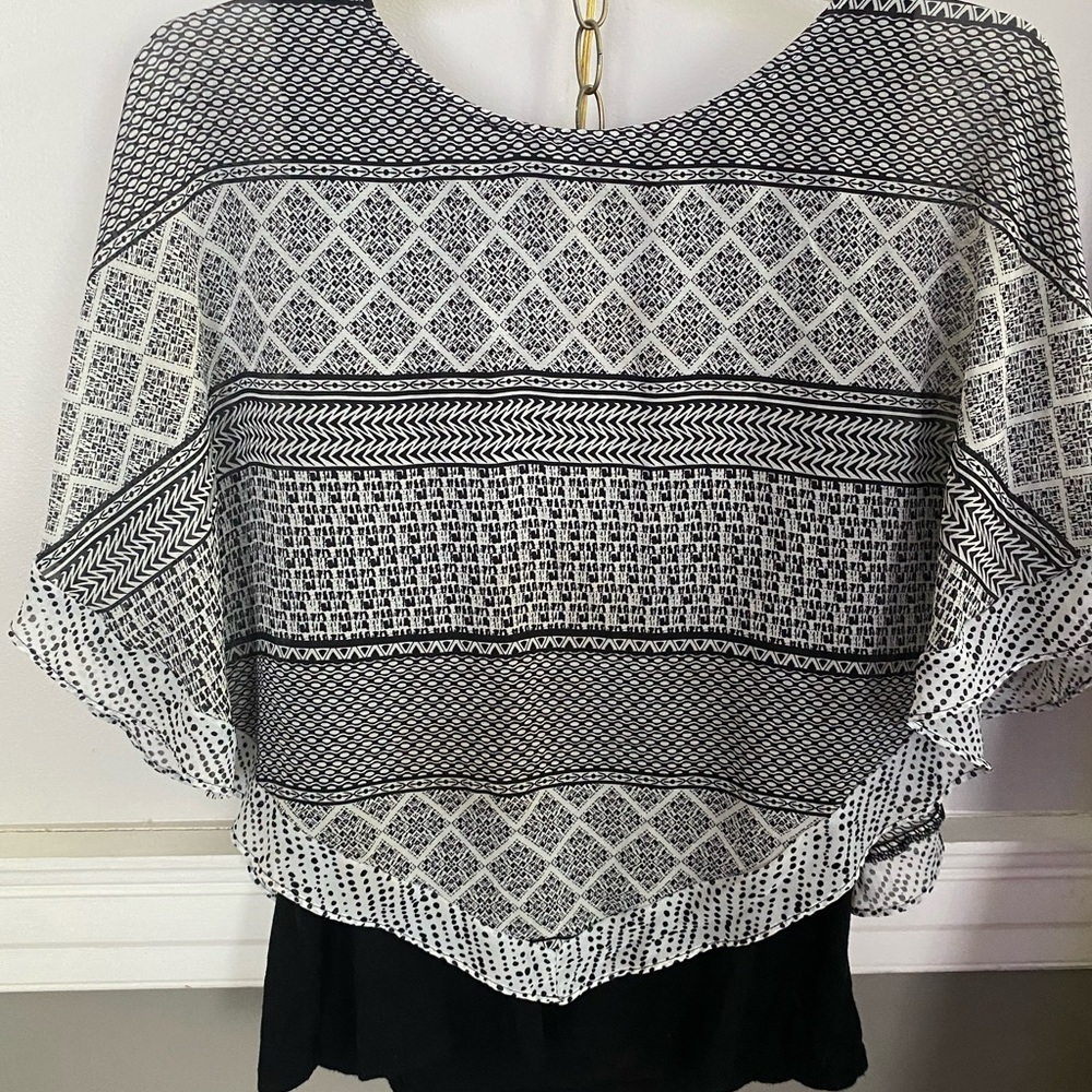 Shear poncho top
